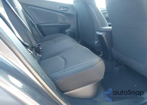 2022 Toyota Prius L from USA, damaged, VIN JTDKAMFU0N3188371